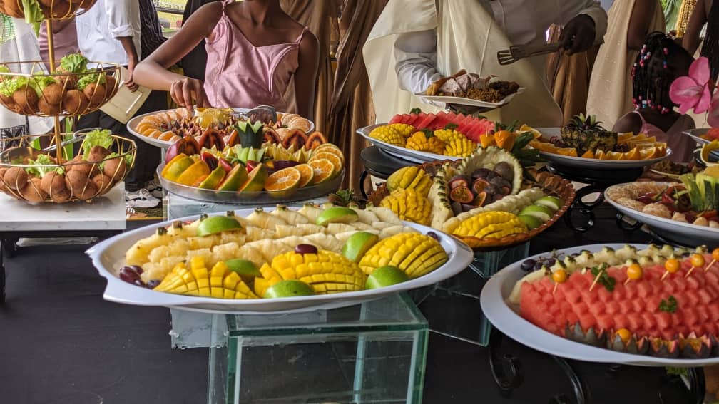 Chef presenting a beautifully plated appetizer